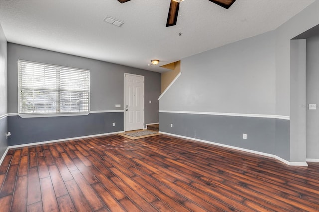 2707 Atlantis Dr, New Smyrna Beach, FL 32168 - spare room with ceiling fan, a textured ceiling, and dark hardwood / wood-style flooring