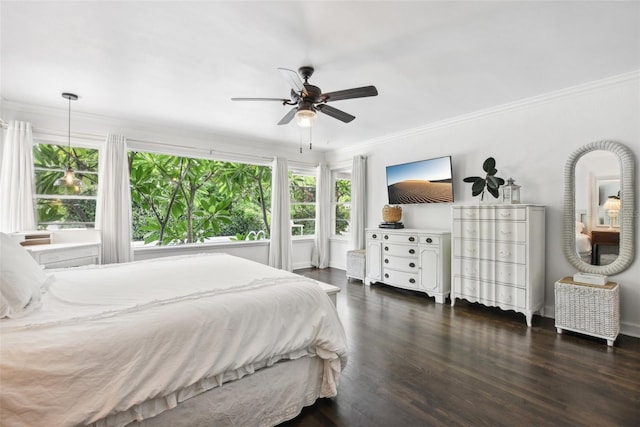 bedroom with ceiling fan, dark wood-type flooring, and ornamental molding