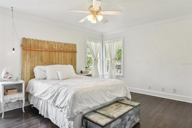 bedroom featuring dark wood-type flooring, ceiling fan, and crown molding