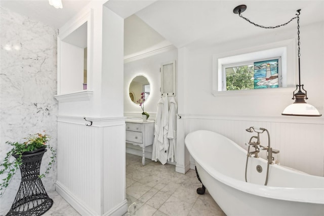 bathroom featuring a bathtub and vanity