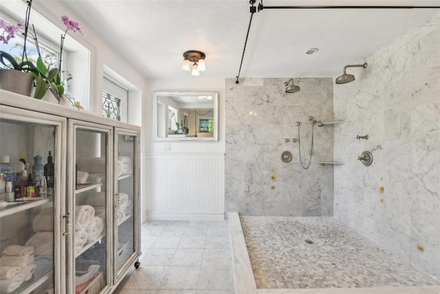 bathroom featuring tiled shower