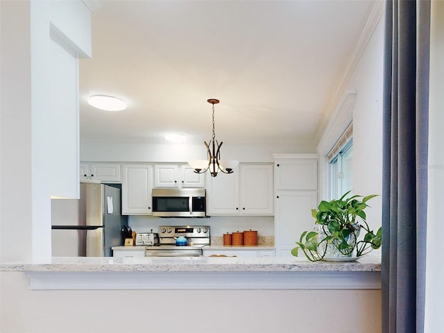 kitchen with stainless steel appliances, white cabinetry, hanging light fixtures, and light stone countertops