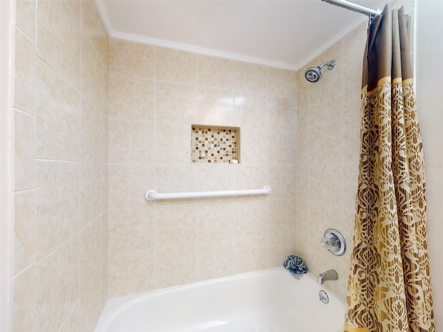 bathroom featuring ornamental molding and shower / tub combo with curtain