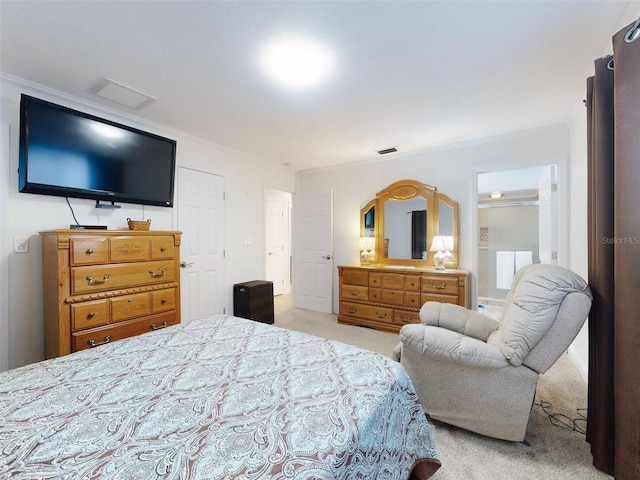 carpeted bedroom featuring ornamental molding