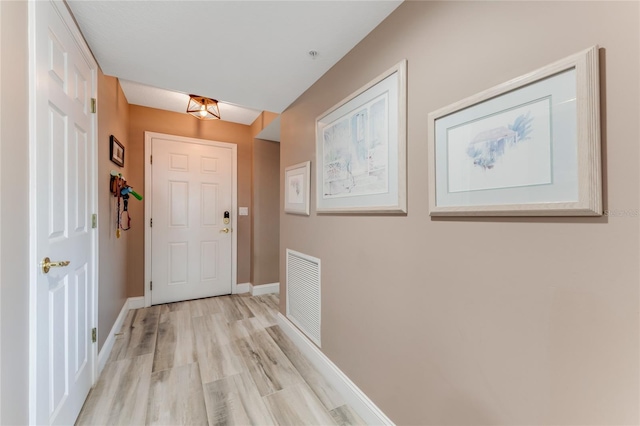 doorway featuring light hardwood / wood-style floors