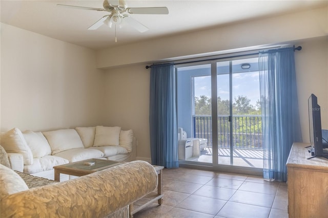 tiled living room with ceiling fan