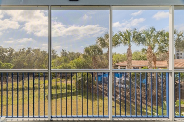 unfurnished sunroom with plenty of natural light