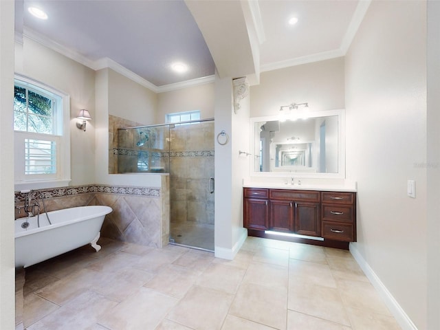 bathroom with tile patterned floors, ornamental molding, plus walk in shower, and vanity