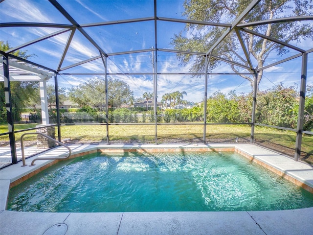 view of pool with a lanai