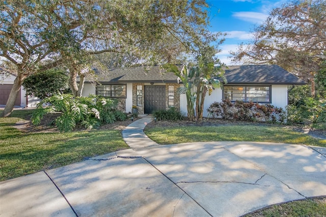 view of front of home with a front yard