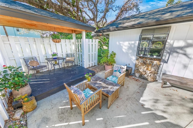 view of patio with an outdoor hangout area and a deck