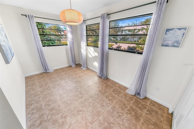 view of tiled spare room