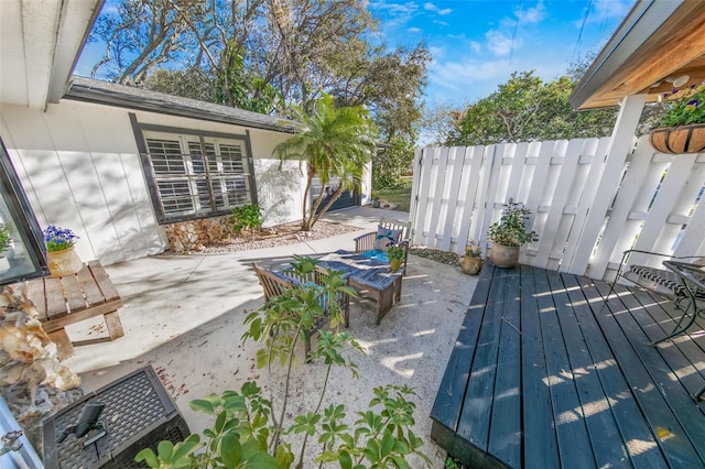 view of patio with a wooden deck