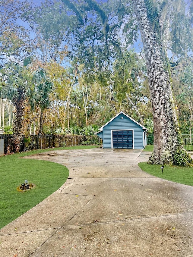 garage with a yard