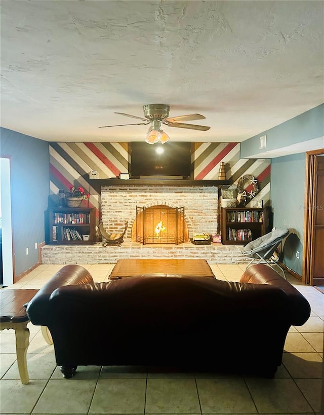 living room featuring tile patterned floors and ceiling fan