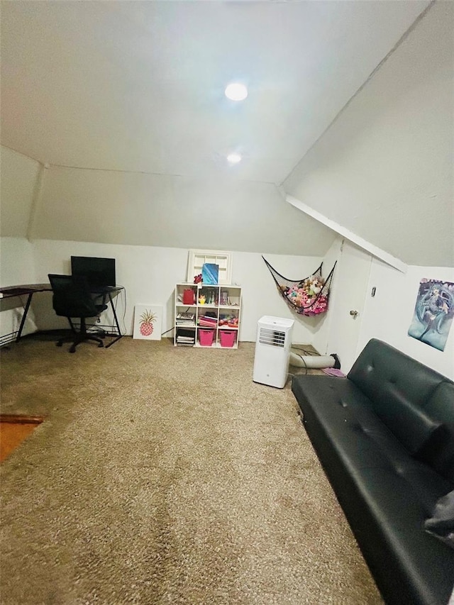 playroom with lofted ceiling and carpet