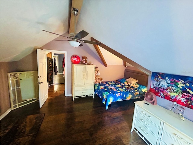 bedroom featuring ceiling fan, dark hardwood / wood-style floors, and vaulted ceiling with beams