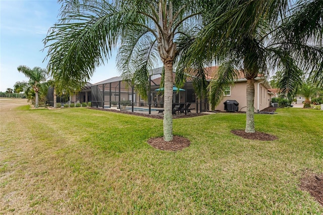 view of yard with a lanai