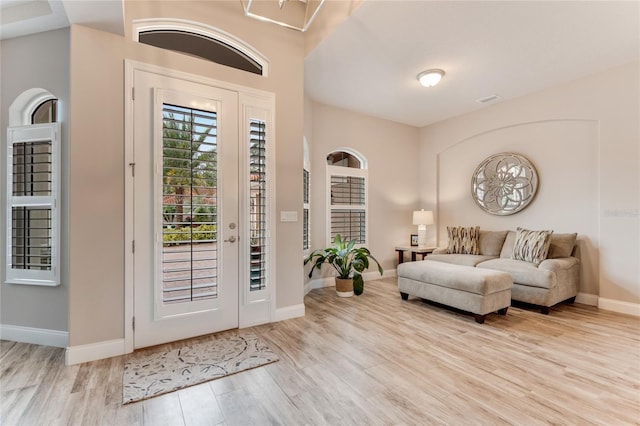 entrance foyer with light wood-type flooring