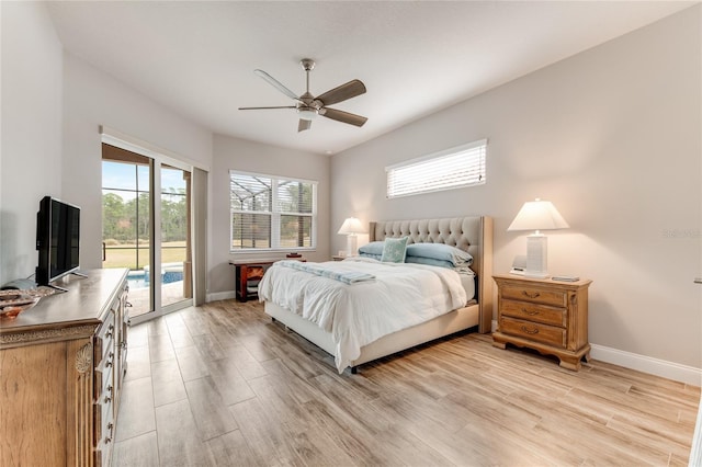 bedroom with ceiling fan, light hardwood / wood-style flooring, and access to outside