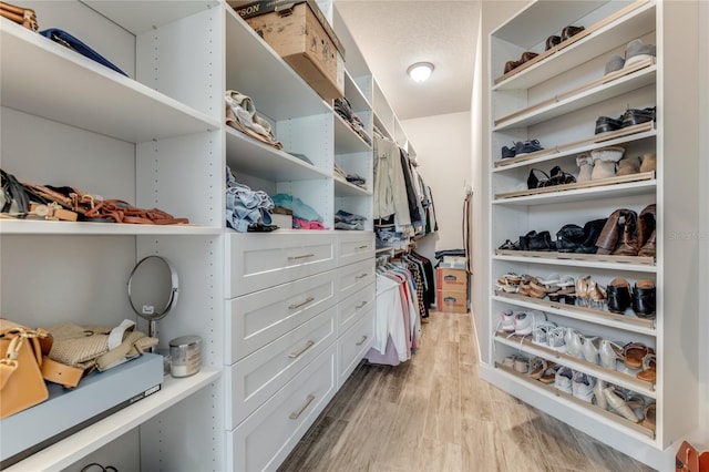 walk in closet featuring light wood-type flooring