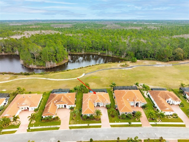 birds eye view of property featuring a water view