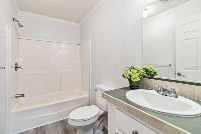 full bathroom with crown molding, hardwood / wood-style flooring, shower / bath combination, vanity, and a textured ceiling