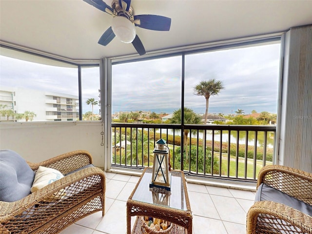 sunroom / solarium with ceiling fan