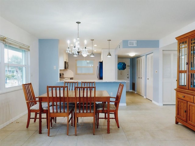 dining area with a chandelier