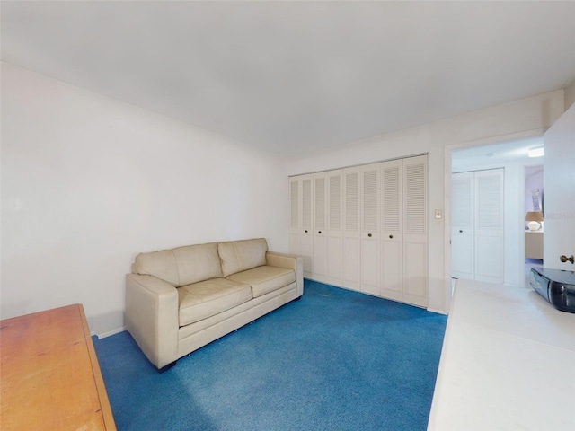 living room featuring carpet floors