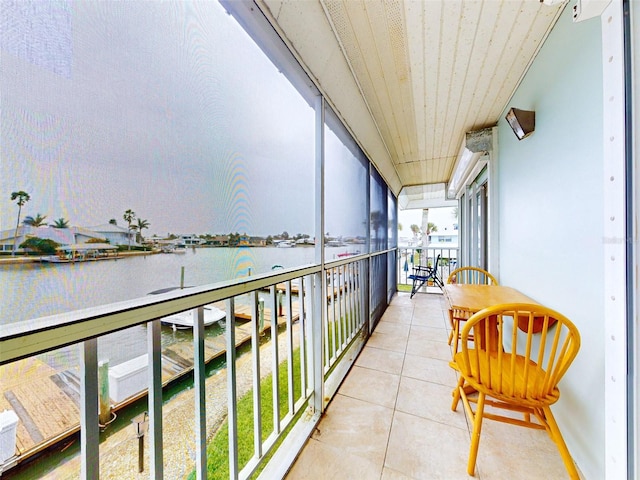 balcony featuring a water view