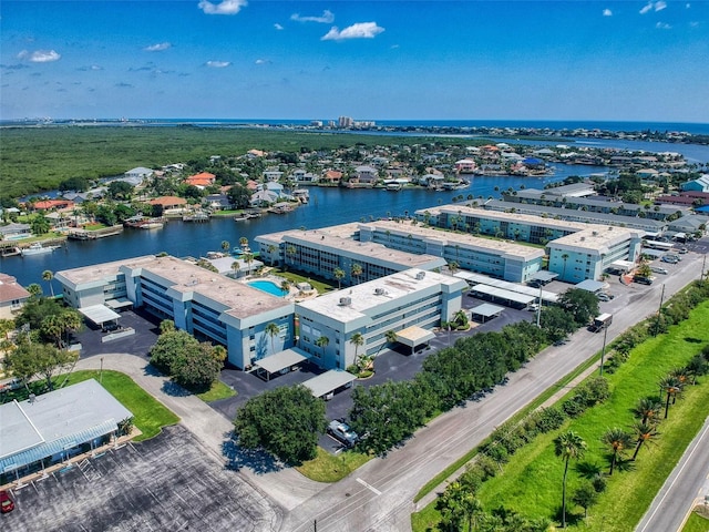 drone / aerial view with a water view