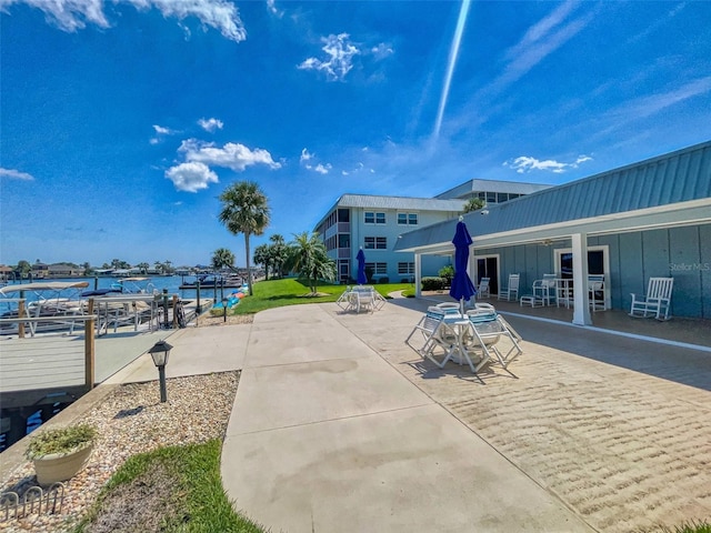 view of patio / terrace with a water view