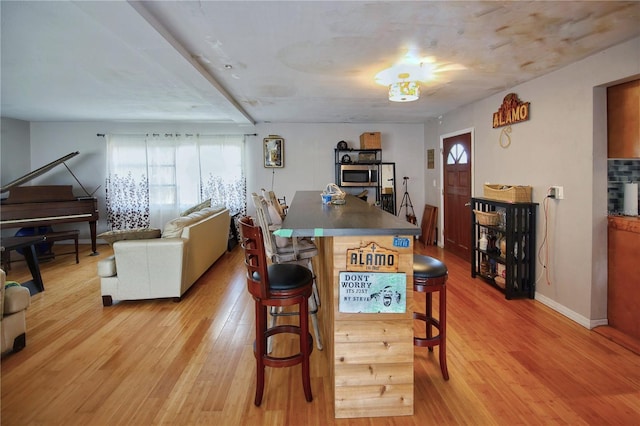 dining space featuring light hardwood / wood-style flooring