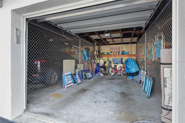 garage featuring a garage door opener