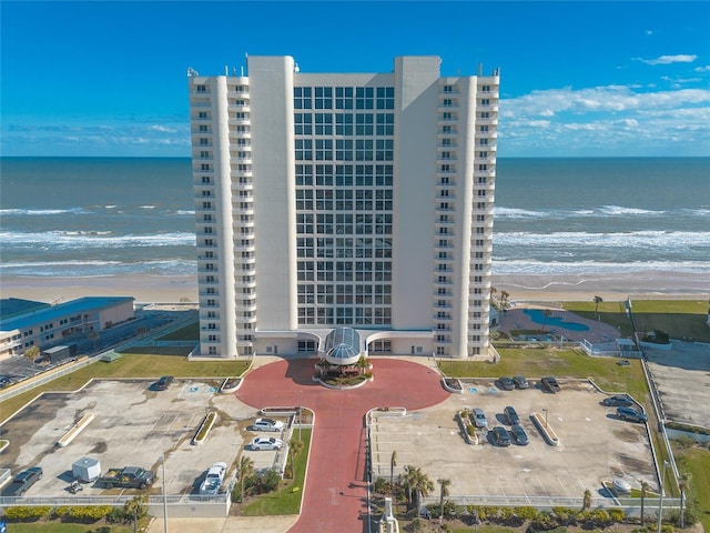 bird's eye view featuring a beach view and a water view