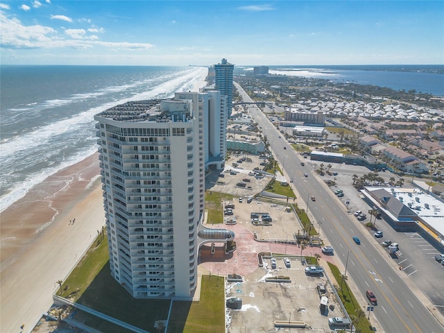 aerial view with a view of the beach and a water view