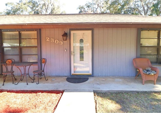 doorway to property featuring a patio