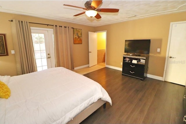 bedroom with ceiling fan and dark hardwood / wood-style flooring