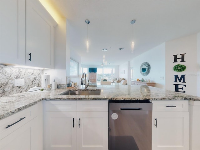 kitchen with white cabinetry, dishwasher, sink, and pendant lighting