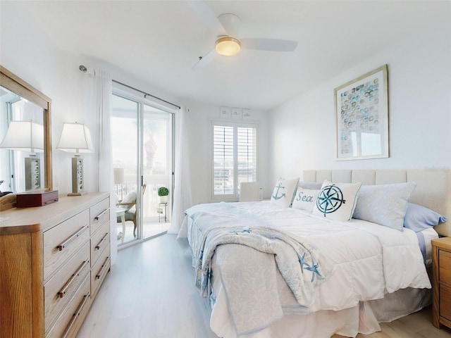 bedroom featuring access to exterior, ceiling fan, and light hardwood / wood-style flooring