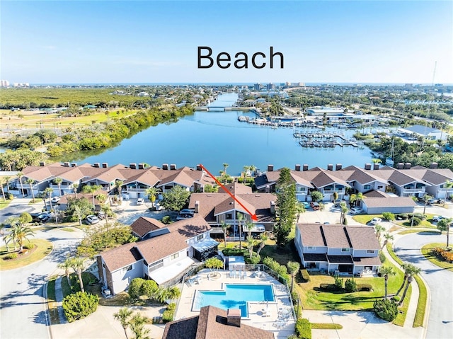 drone / aerial view with a water view