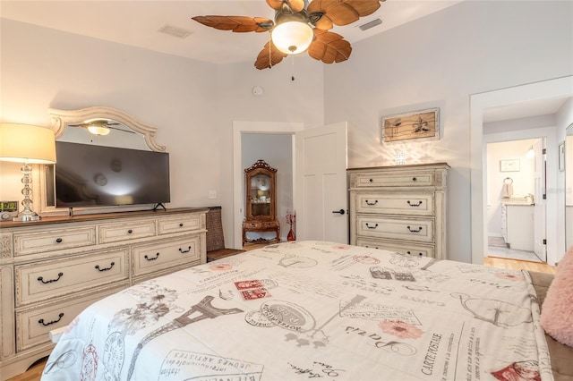 bedroom featuring ceiling fan and ensuite bathroom