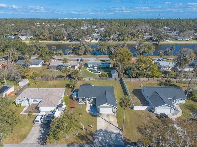 drone / aerial view with a water view