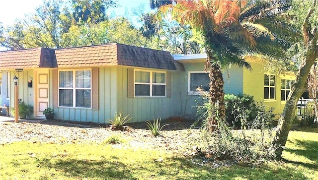 view of home's exterior featuring a yard