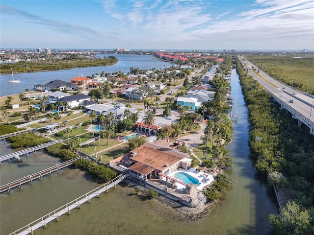 birds eye view of property featuring a water view