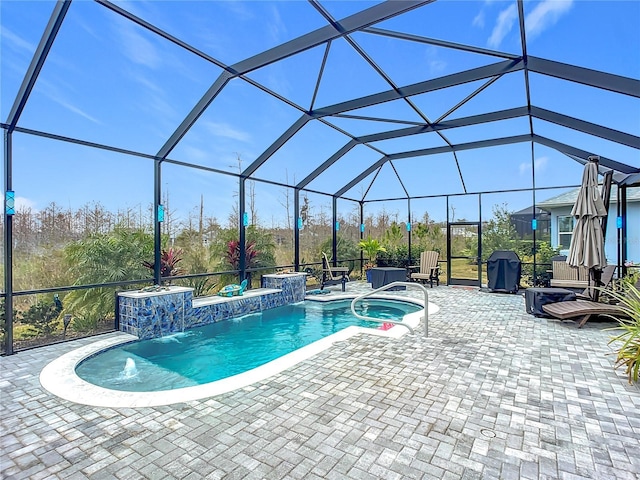 outdoor pool with a lanai, a grill, a jacuzzi, and a patio