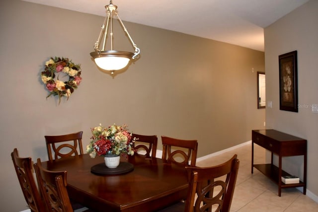 dining area with light tile patterned floors