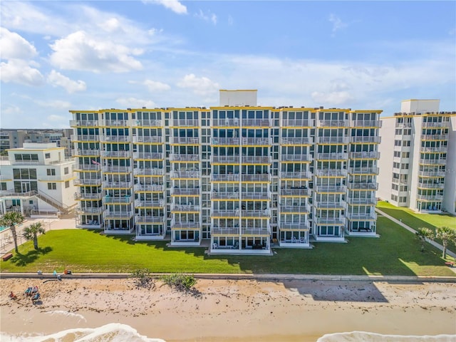 view of property featuring a view of the beach