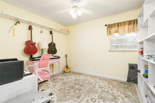 interior space with ceiling fan